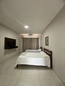 Apartamento 102 - Suíte com ar condicionado - 帕特罗西尼乌