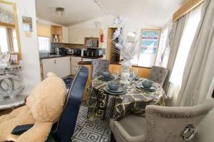 Big2vacation 2 Exclusive at new beach caravan holiday free parking wifi gaming chair swimming pool decking fun activities games food facilities club house arcade walk to beach