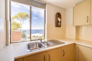 The Point 13, 5-7 Mitchell St - stunning water views, complex pool and WiFi