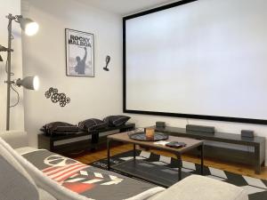 Maisons de vacances Maison entiere avec espace cinema : photos des chambres