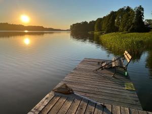 Mazury - Komfortowy dom z własną plażą i pomostem