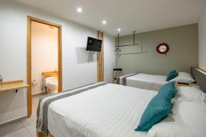 Capital O Hotel Terraza 158