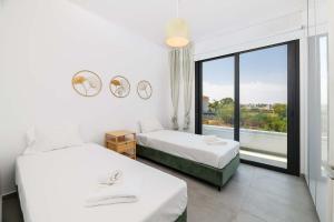 By The Beach - Blue Topaz Villa