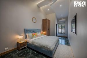 StayVista at The Windchime with Pool & Gazebo