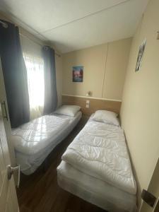 Campings Mobil home au bord de la mer, vue sur la mer camping de la falaise a Equihen-Plage : photos des chambres