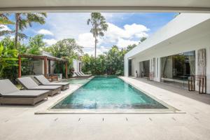 New Brawah 5 BR Villa 200m to Finns Beach Club