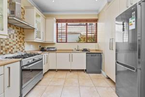 Spacious Claremont Home with Pool Fireplace