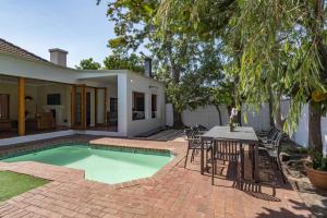 Spacious Claremont Home with Pool Fireplace