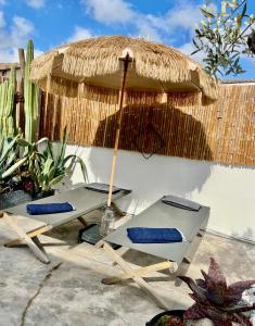 Maisons de vacances Maison avec bassin dans les remparts : photos des chambres