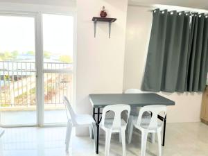 Kcc cozy condominium