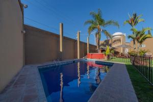 Capital O La Huerta Golf & Hotel