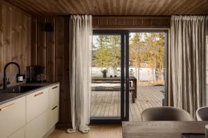 Villa Lakehouse Cedar with sauna, boat & jacuzzi