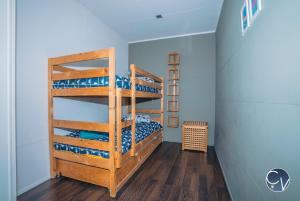 Maisons de vacances Maison en pierre avec piscine a Barjac, 16 personnes : photos des chambres