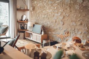 Appartements Gite de charme dans ancienne ferme en pierre : photos des chambres