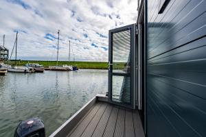 Waterlodge voor 4 personen in de haven van Kamperland