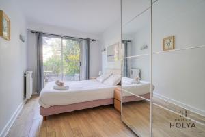 Appartements Proche de Paris - La Populaire - 5MB : photos des chambres