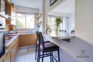 Appartements Proche de Paris - La Populaire - 5MB : photos des chambres