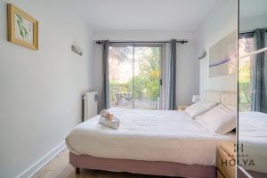 Appartements Proche de Paris - La Populaire - 5MB : photos des chambres