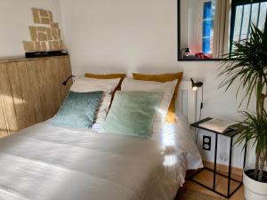 Appart'hotels AUX 4 LOGIS Appart-hotel - Studio Le City - Petit dejeuner inclus 1ere nuit : photos des chambres