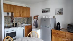 Appartements Studio vue sur lac et montagne : photos des chambres