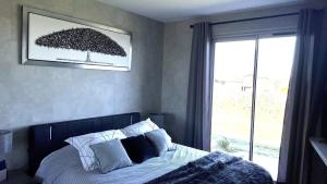 Villas Villa spacieuse avec piscine au milieu des vignes : photos des chambres