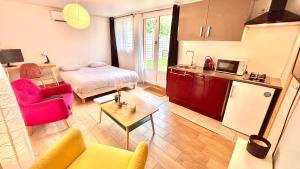 Appartements SECRET GARDEN parking hyper centre & calme : photos des chambres