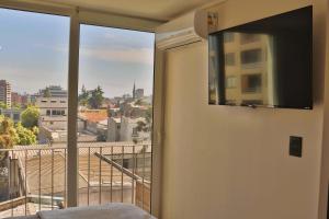 HOM I WiFi, AA, Terraza, Transporte, Acceso seguro