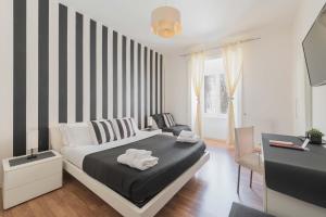 Deluxe Double Room (2 Adults + 1 Child) room in Rione Monti Suites