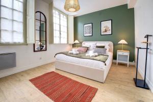 Appartements OIQIA • Harmonie : photos des chambres