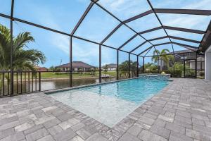 Gulf Access, Pool with Spa, Grill & Lanai - Ladyfish Landing - Roelens Vacations