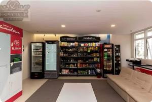 Temático,moderno e com pôr do sol MuellerCentro