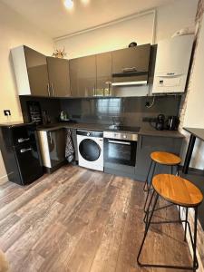 Appartements L-univers automobile au coeur de Mulhouse : photos des chambres
