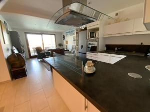 Appartements Appartement de Standing Face au port avec ascenseur : photos des chambres