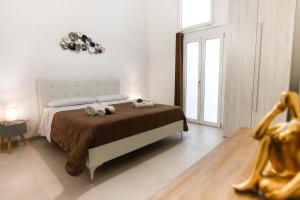 Elegante Bilocale con Giardino