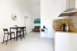 Elegante Bilocale con Giardino