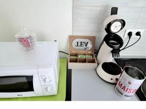 Appartements Verdant Oasis - proche du centre - Wifi gratuit - parking a proximite : photos des chambres