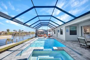 Gulf Access, Heated Pool and Spa, Tiki Hut, & Bikes - Cape Clover - Roelens Vacations