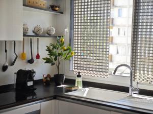 Appartements Au jardin suspendu : photos des chambres