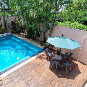 A tropical paradise; stunning house, pool, garden