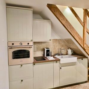Maisons d'hotes Le cottage Maisonnette dans corps de ferme : photos des chambres