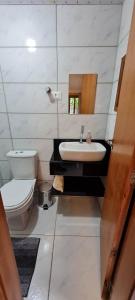 Quarto aconchegante perto da praia