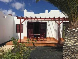 Encantador bungalow con vistas a la piscina