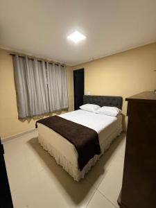 Casa Sol Nascente - Próxima ao Centro com Piscina e Ar Condicionado