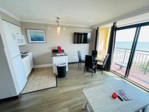 Stay on the beach at this ocean front condo