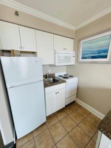 Stay on the beach at this ocean front condo