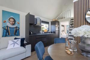 Tiny Wellness House in Heinkenszand with a private sauna, hottub, garden, airco, free wifi, boutique design and a luxury wellness experience