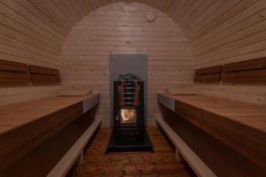 Tiny Wellness House in Heinkenszand with a private sauna, hottub, garden, airco, free wifi, boutique design and a luxury wellness experience