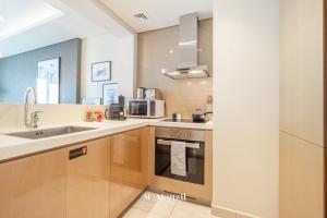 Manzil - Luxury 1BR Apartment in Paramount Top-Floor Retreat