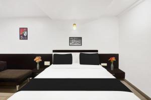 Super Townhouse City Center Near Mysore Palace Formerly Aavass Inn