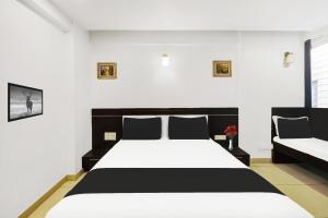 Super Townhouse City Center Near Mysore Palace Formerly Aavass Inn